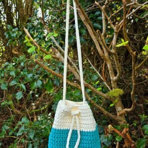 cream and green drawstring bag